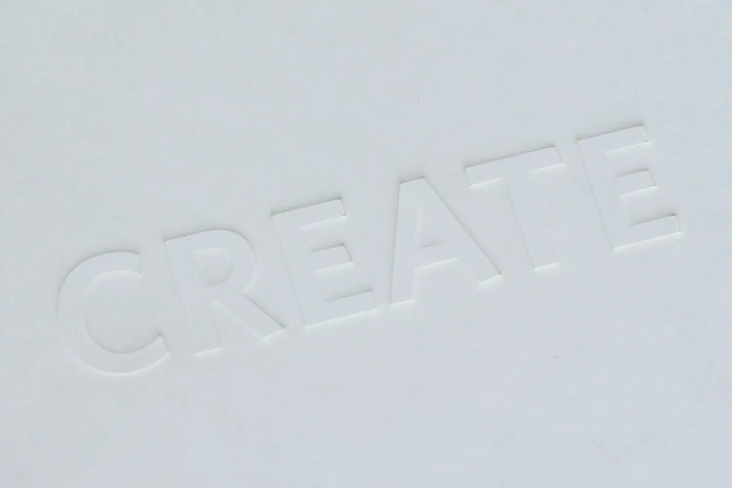 Debossed 'CREATE' on cover